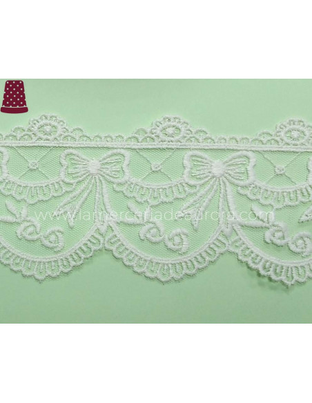 Encaje de tul bordado marfil (ancho 7 cms) lazos