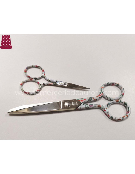 Tijera costura decorada modelo flores fondo blanco de Palmera