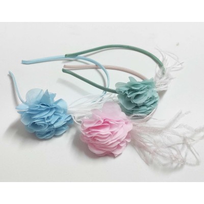 Diadema con pluma y flor peonía de Siena 2